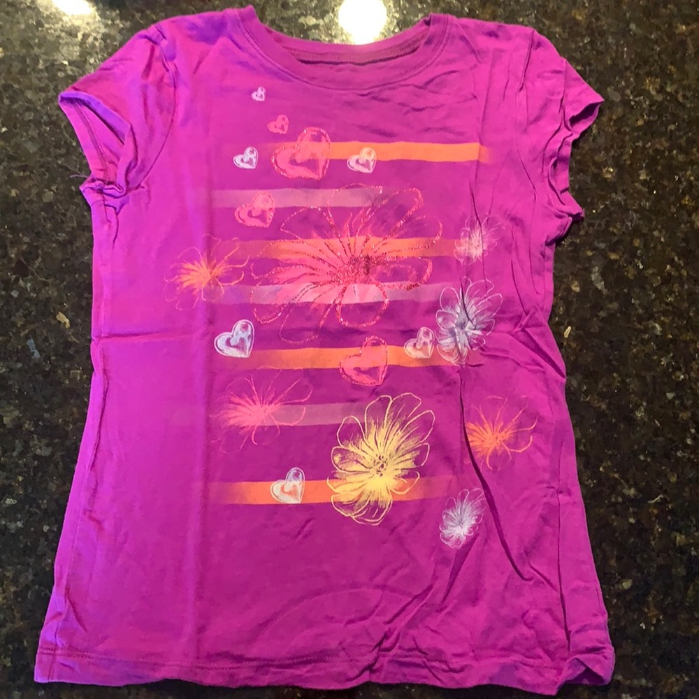 Dark pink tshirt with flower/heart print in the front, size Youth L